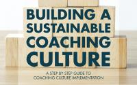 Book Cover: Building a Sustainable Coaching Culture. White Background. Black Letters on Wooden building blocks